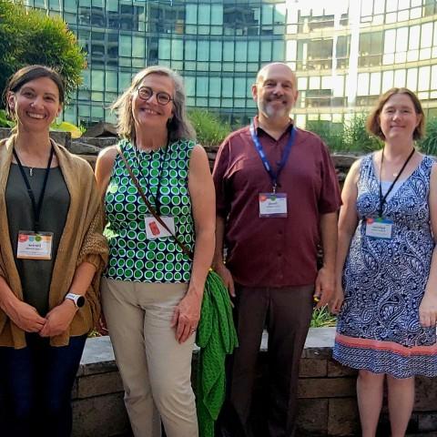 A group of UNE researchers poses outside at a conference in Washington, D.C.